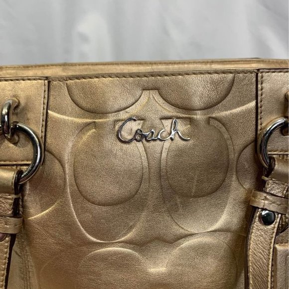 COACH gold handbag. Purple lining. Embedded coach logo. Big outside pock… - Picture 3 of 10